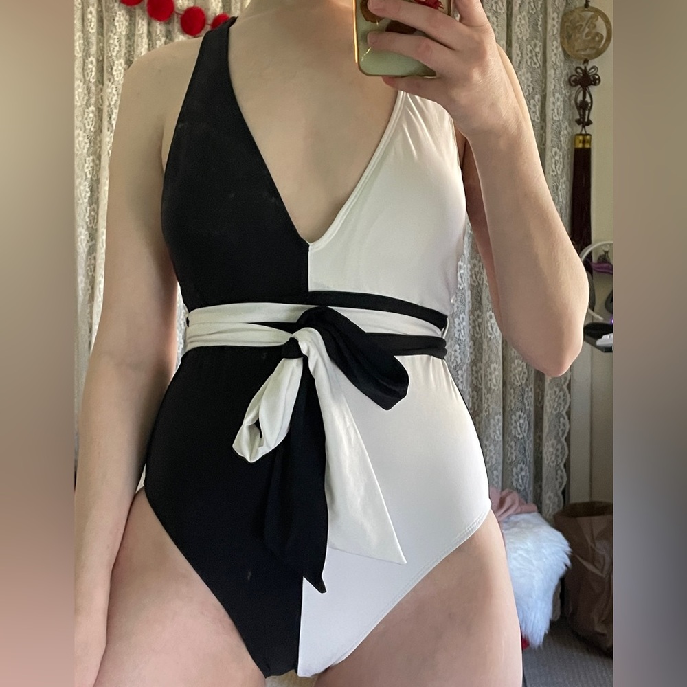 One piece swimsuit monochrome black and white two tone with ties. Brand new!